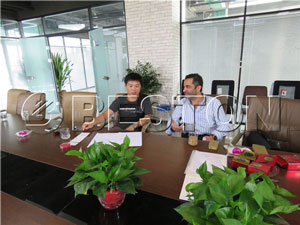 Mr. Afshin Aghili talking with the sales manager